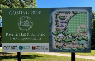 Hall and Ballfield project sign showing plans